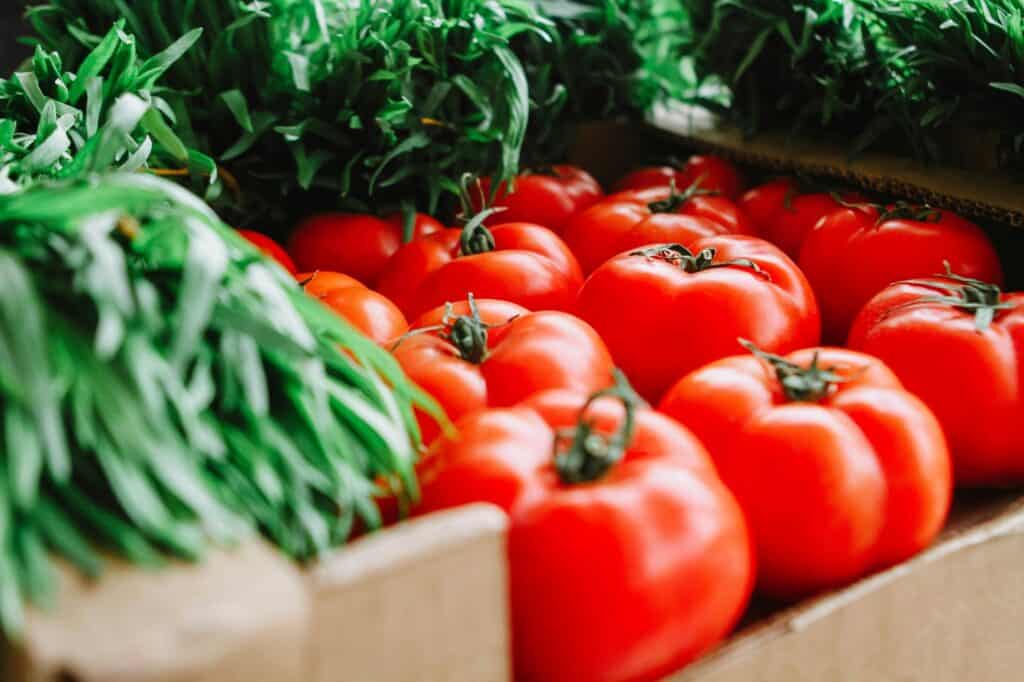 Closeup of tomatoes in a farmers' market in the concept of 'best local shops and markets in Dulwich'.