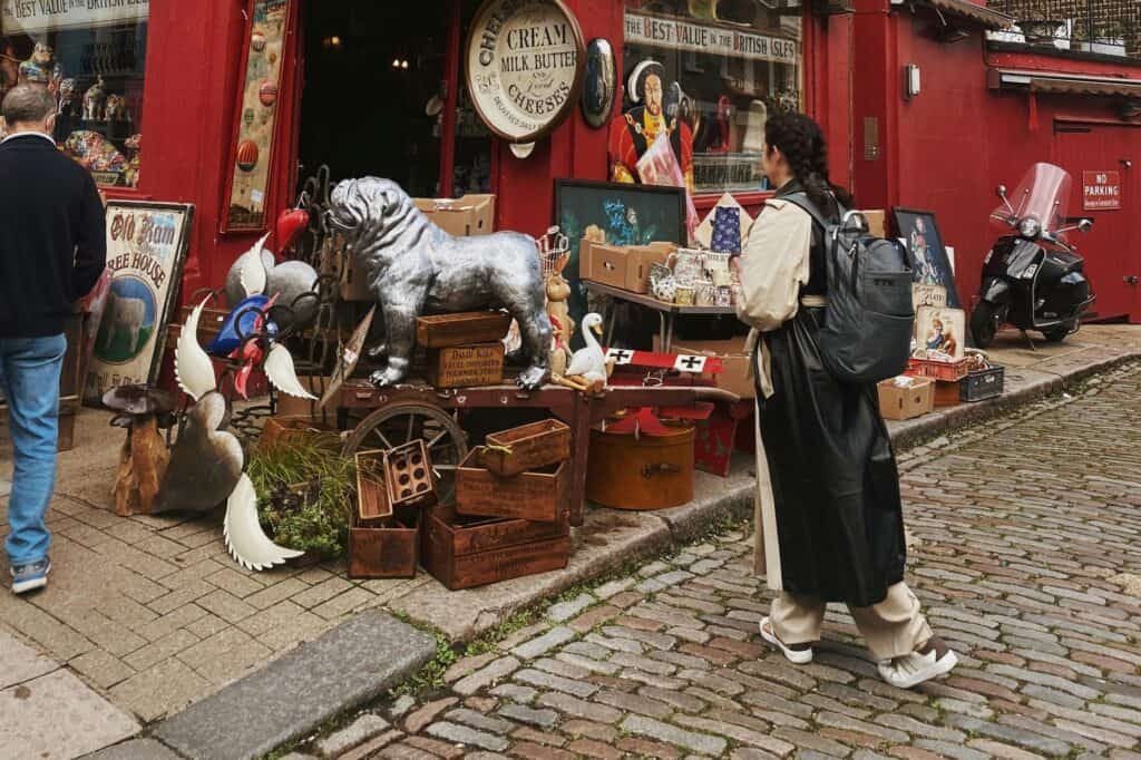 People checking items in an antique shop